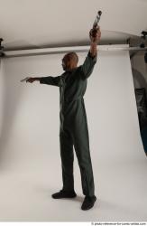 ERIC PILOT STANDING POSE WITH GUNS